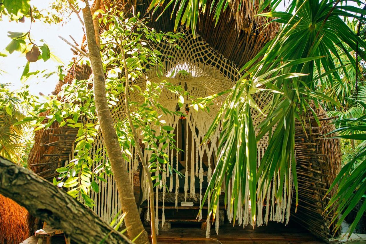 Ikal Tulum Hotel Экстерьер фото A hammock in a jungle