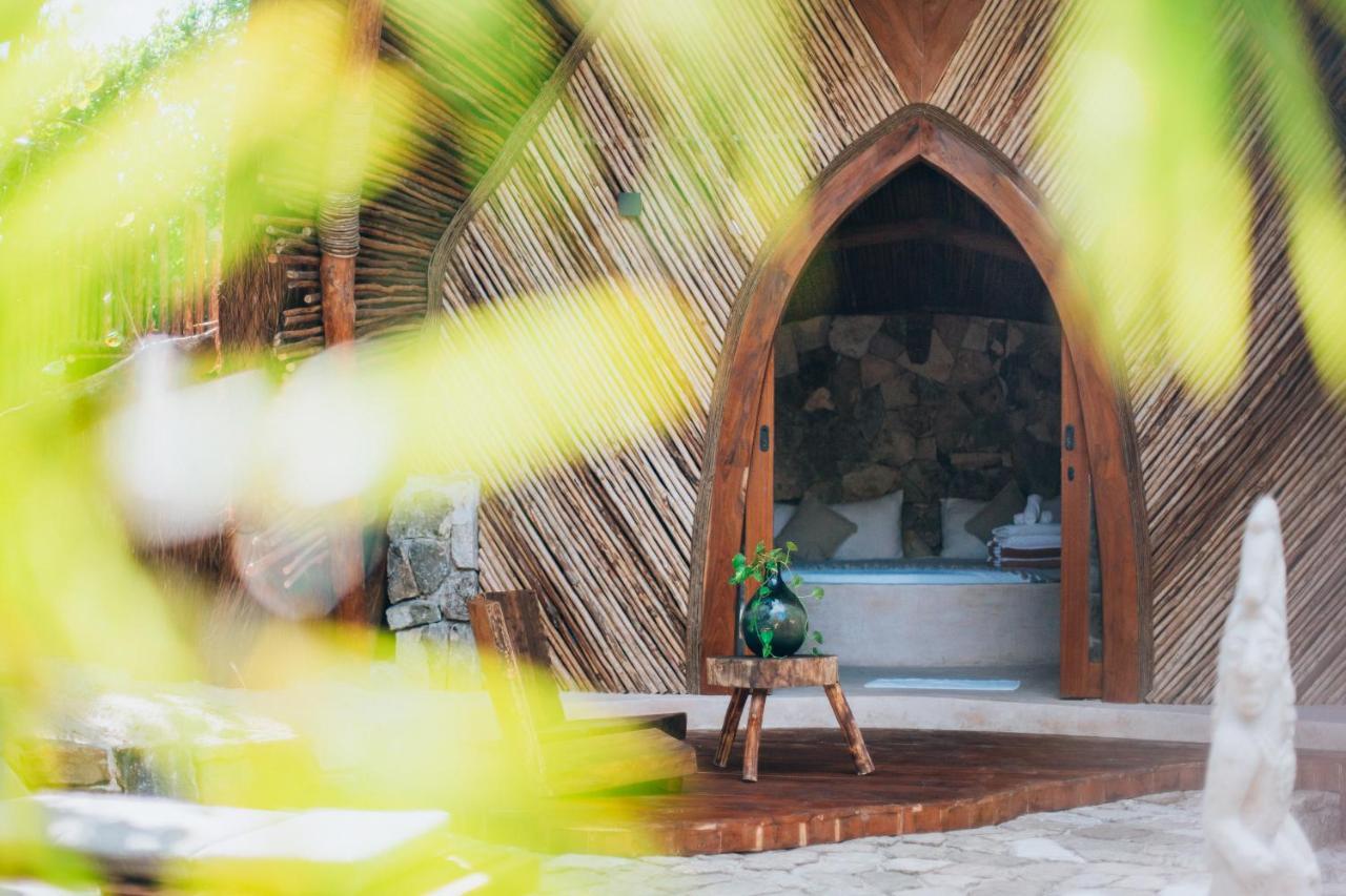Ikal Tulum Hotel Экстерьер фото The entrance to the chapel
